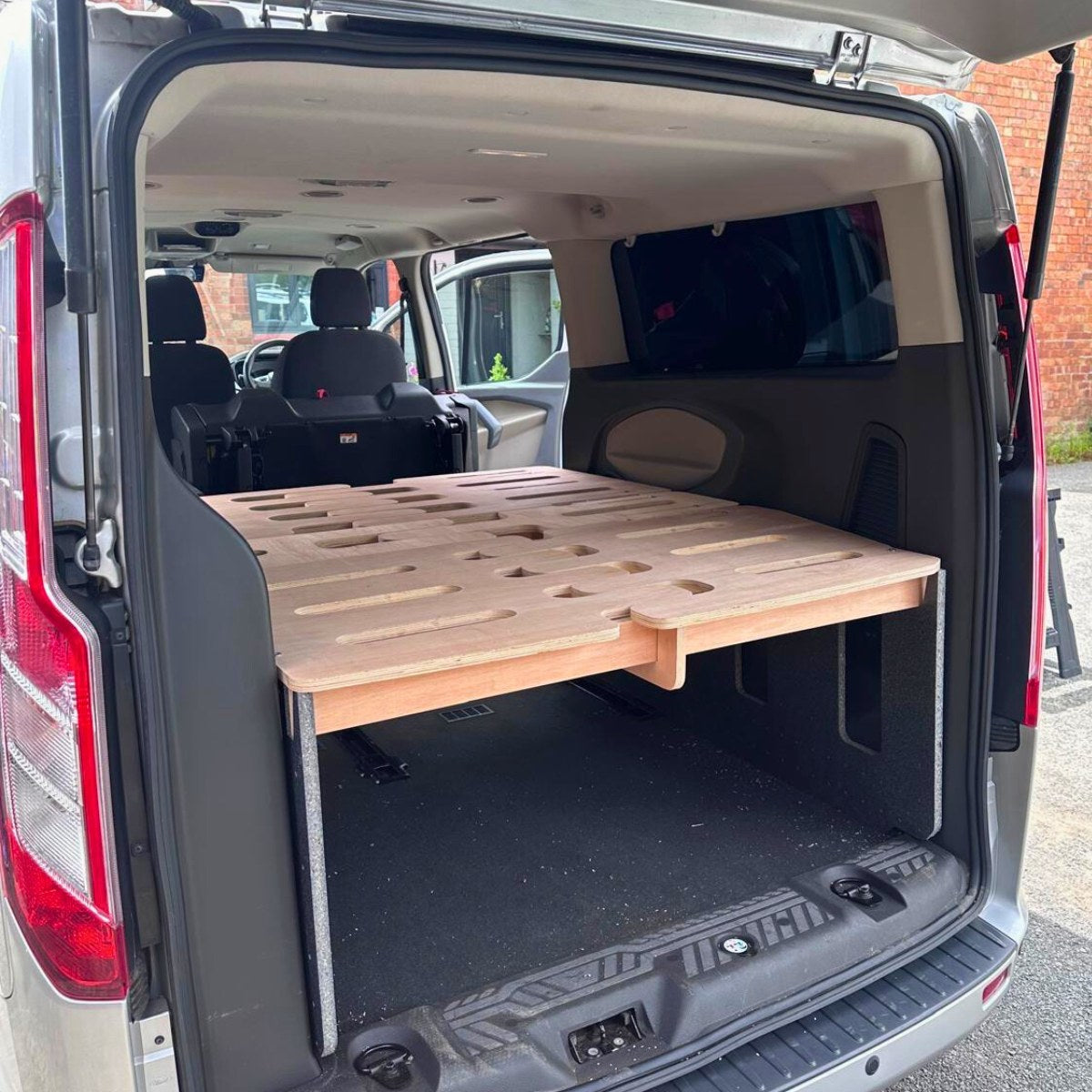 Campervan conversion kit installed in a Ford Tourneo Custom 2013-2021.