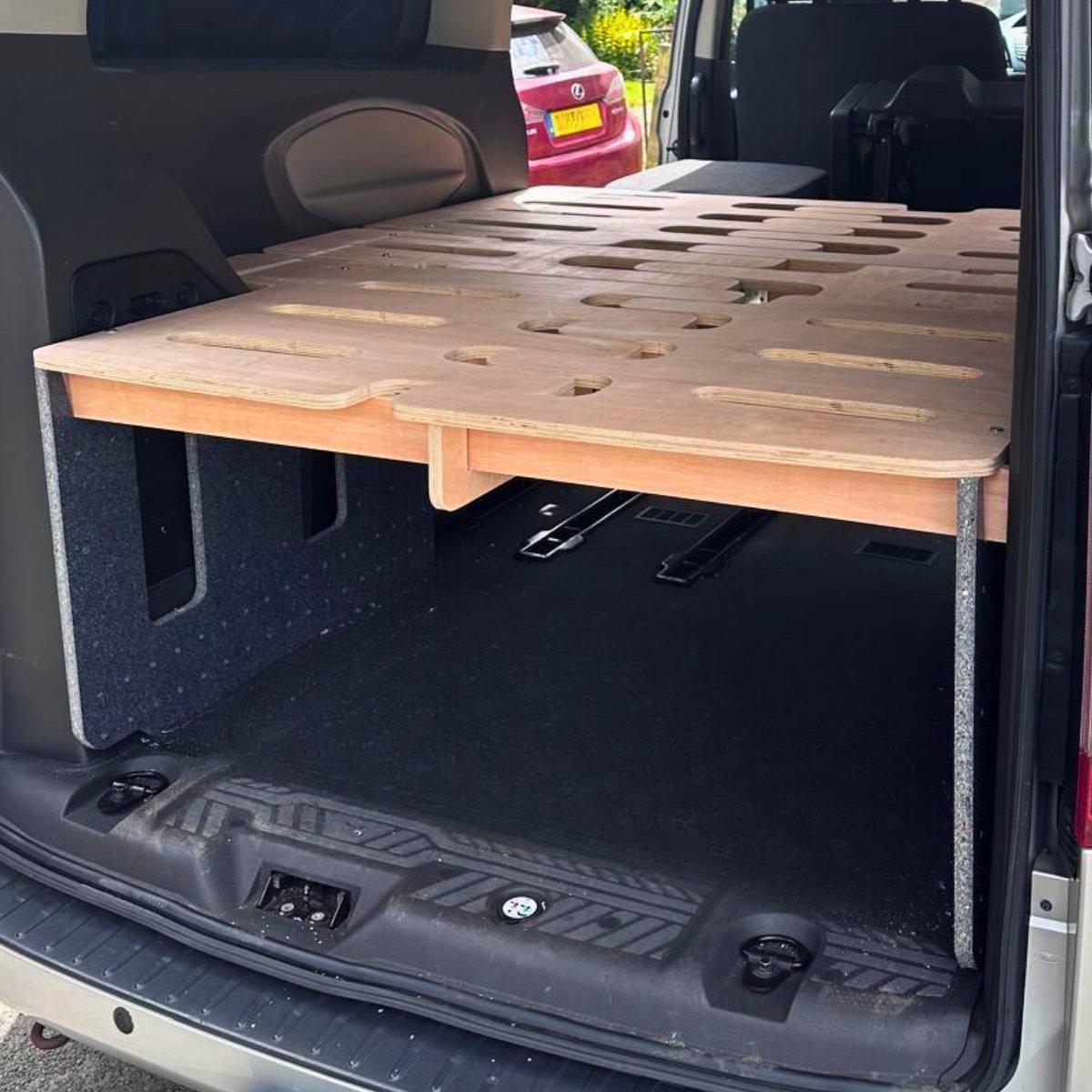 EKOply nd wooden structure using sustainable materials in this campervan convereter.